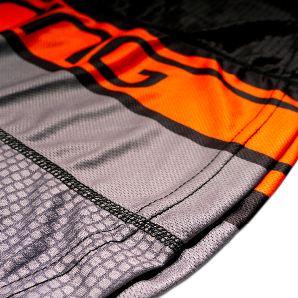 Playera de tirantes de la onceava edición del maratón. Gris con detalles en naranja